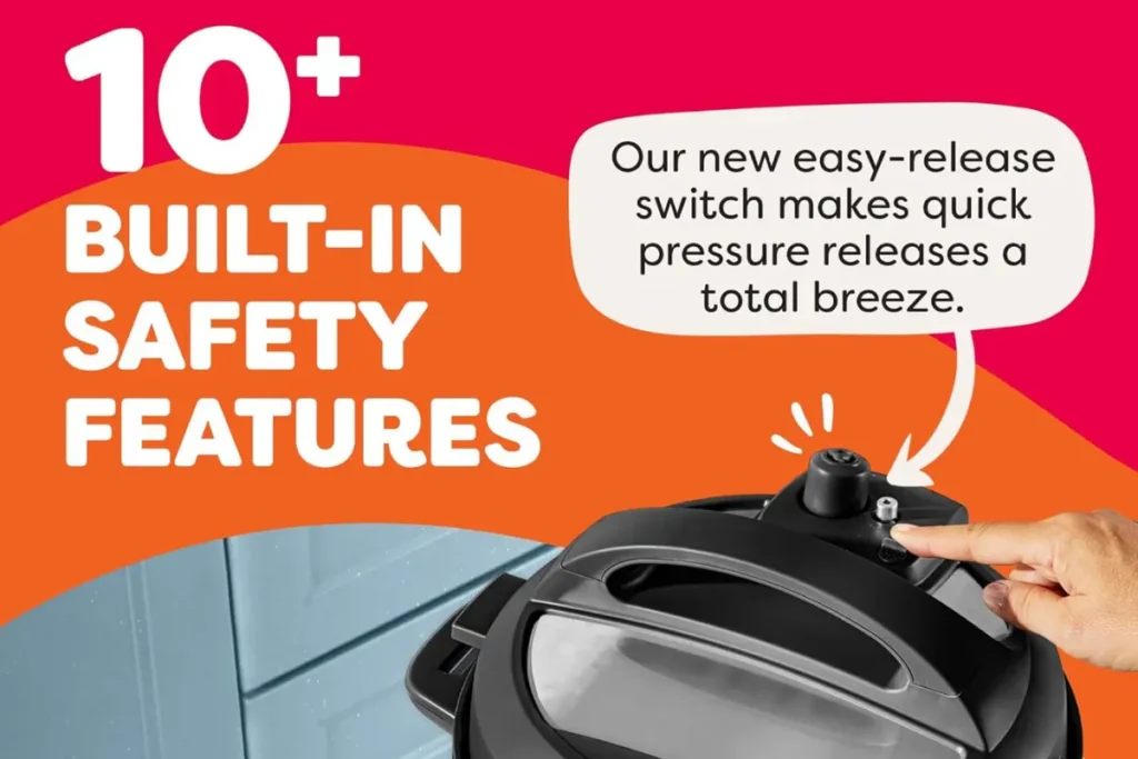 The Instant Pot Duo 7-in-1 electric pressure cooker with the switch pressed